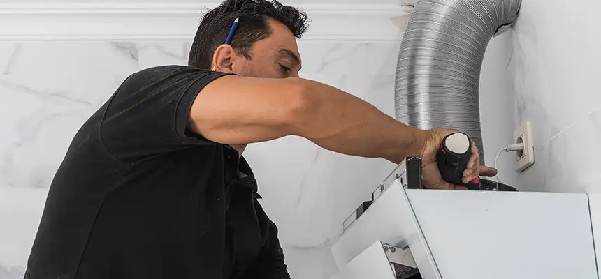 Precision In-wall Dryer Vent Cleaning & Rerouting Corrections in Kendall, FL